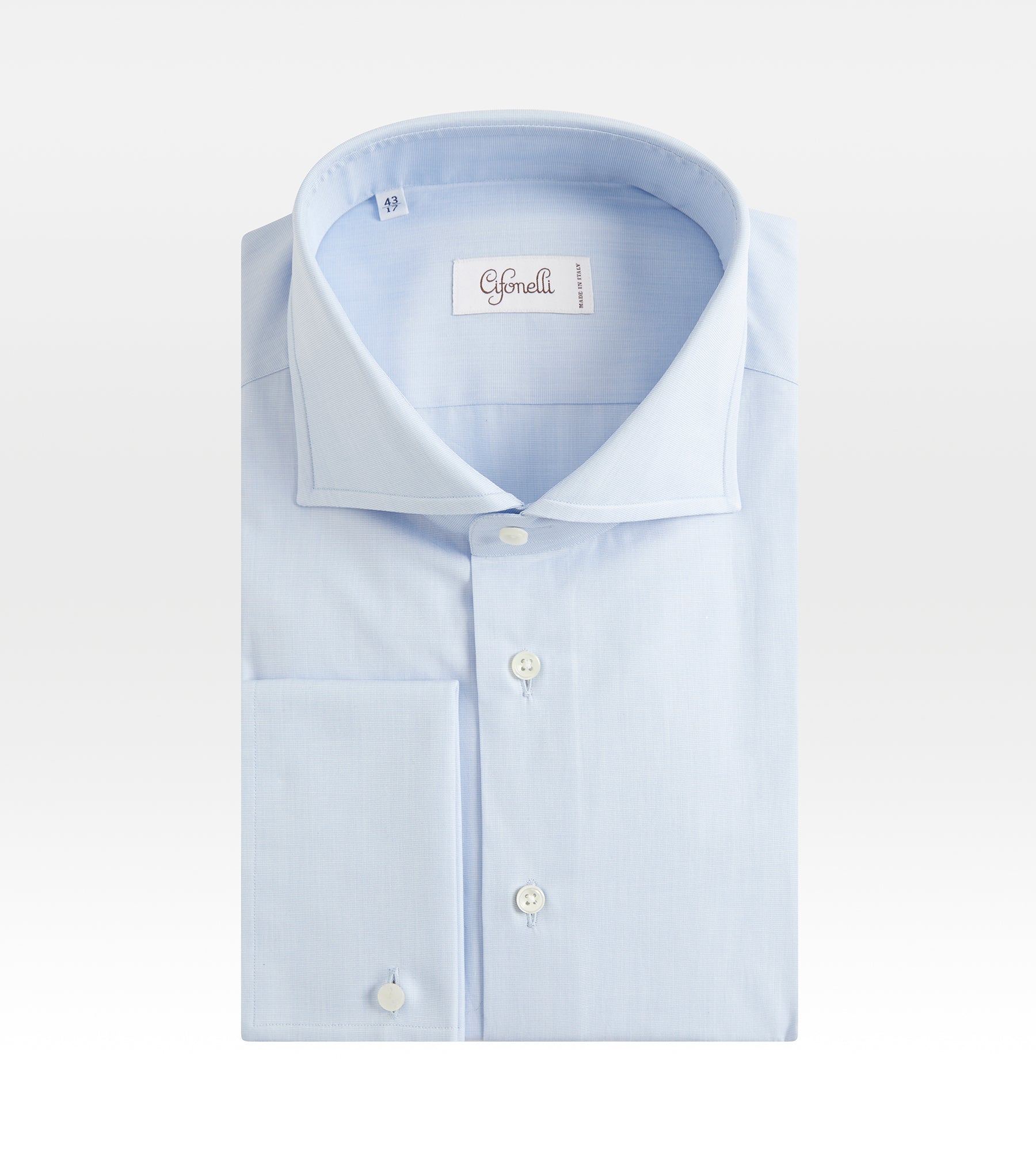 Chemise bleue en coton à poignets mousquetaires
