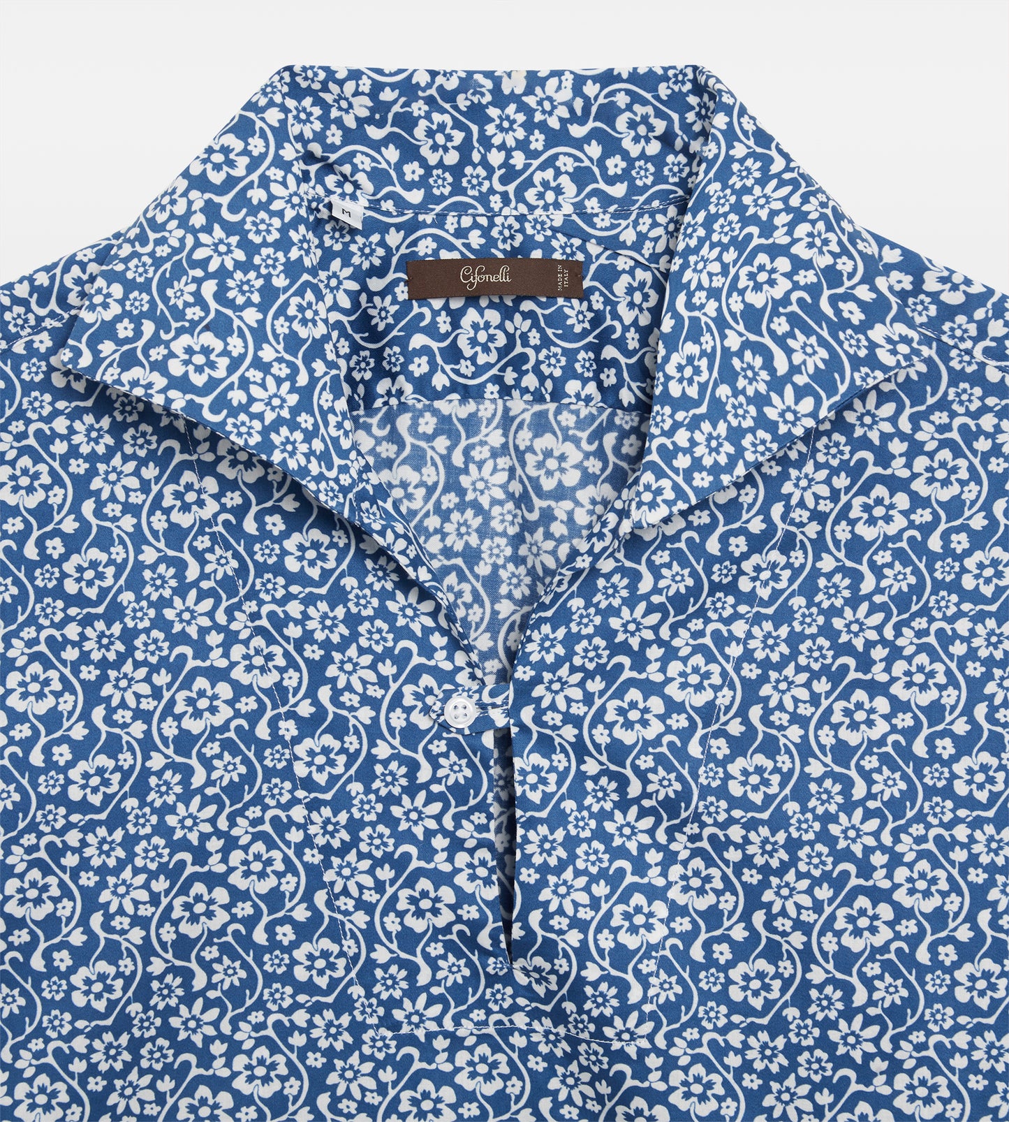 Polo bleu à fleurs