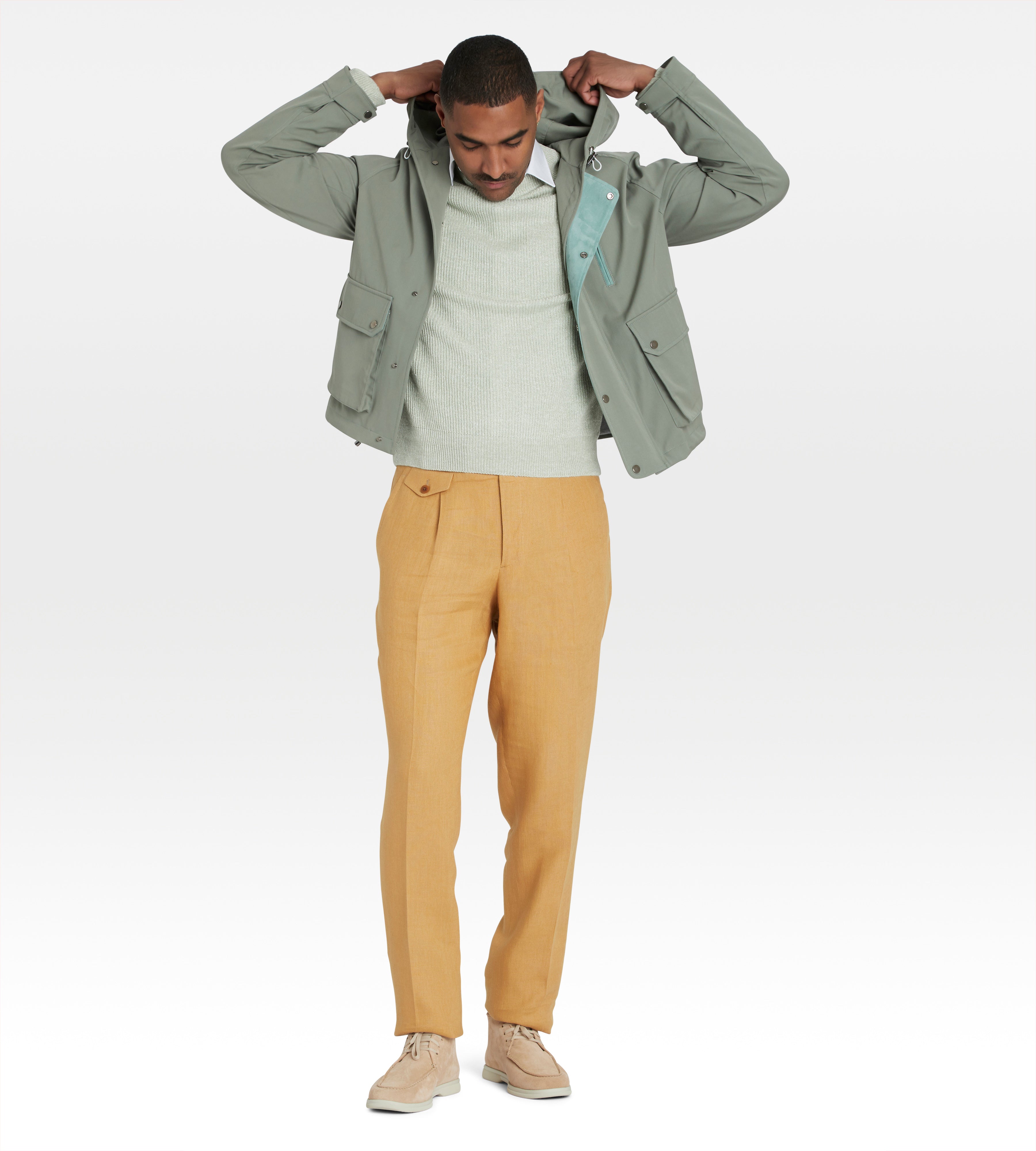 Blouson vert à capuche