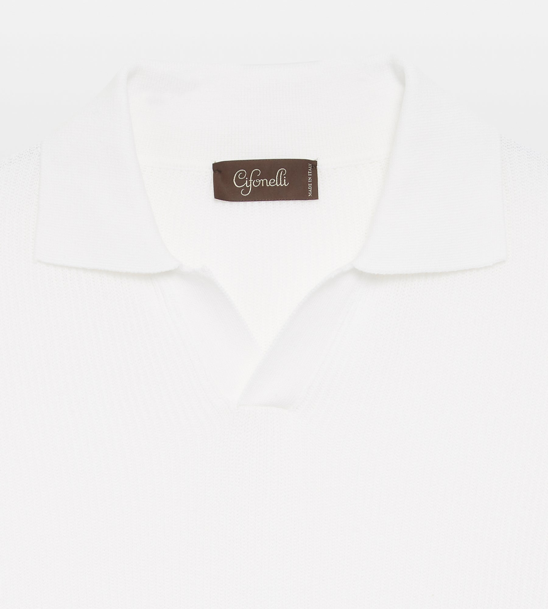 Polo en coton blanc tricoté
