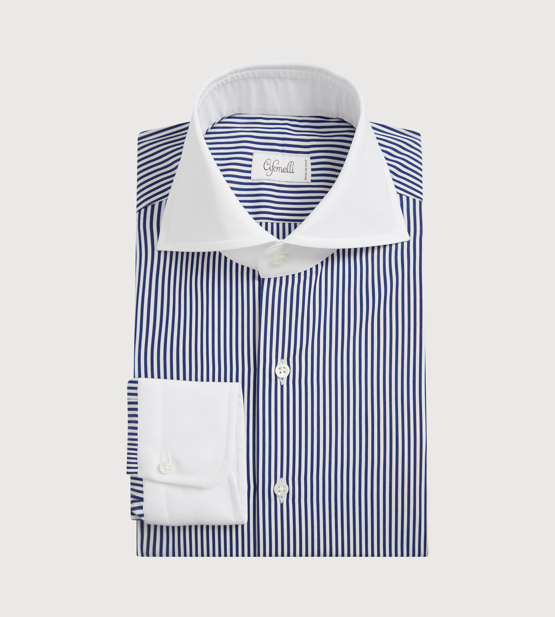 Chemise à rayures bleu marine avec col et poignet blancs