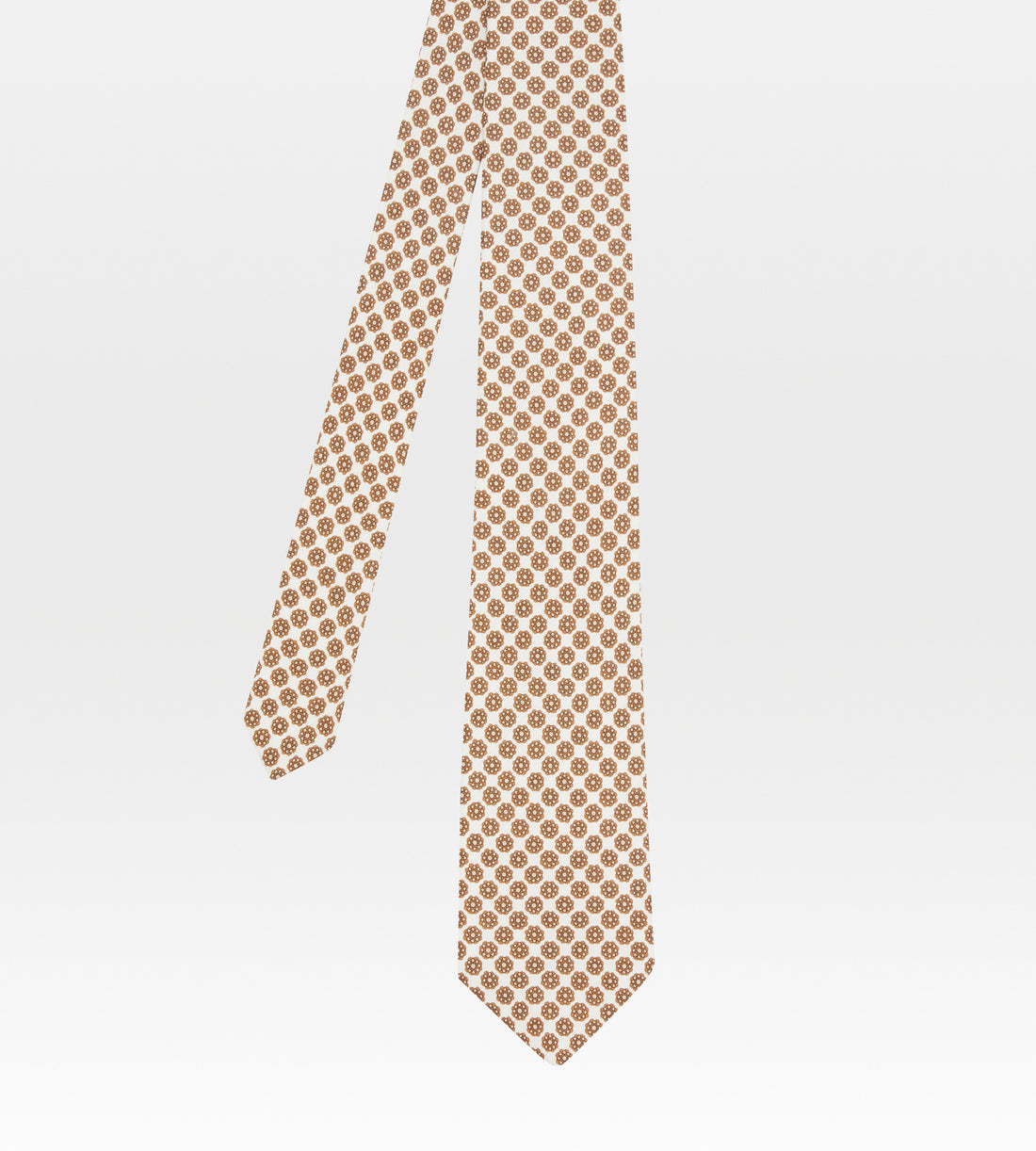 Beige tie with small flowers